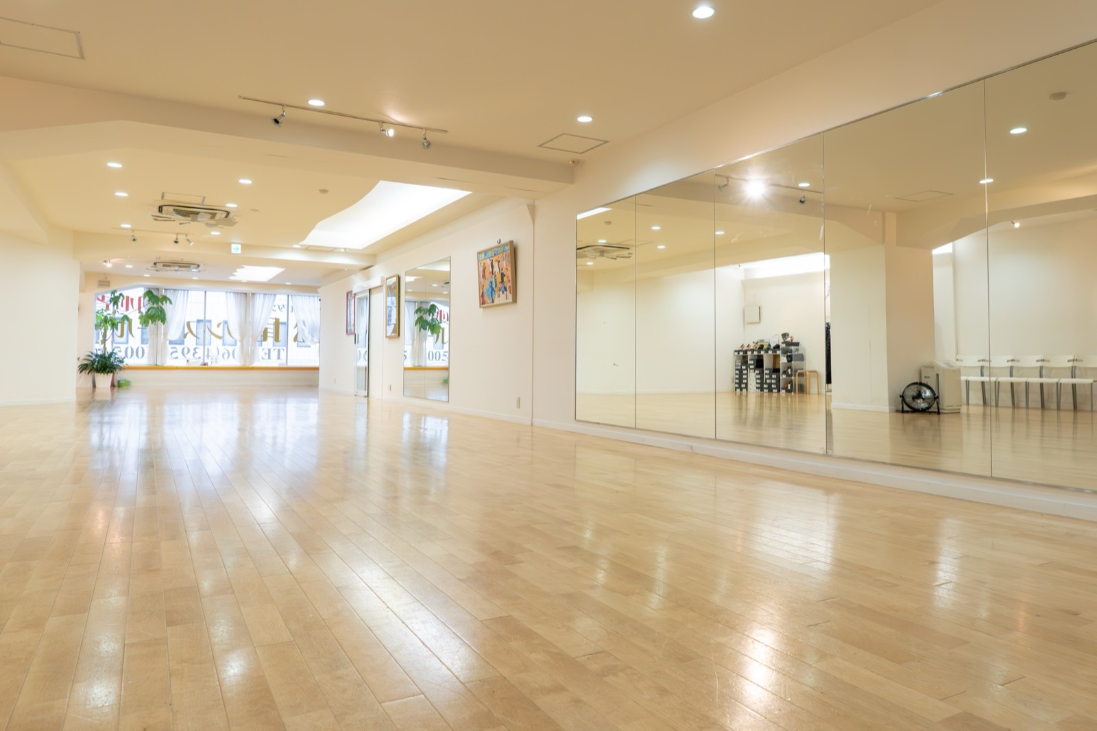 The studio floor, with mirrors and light wood